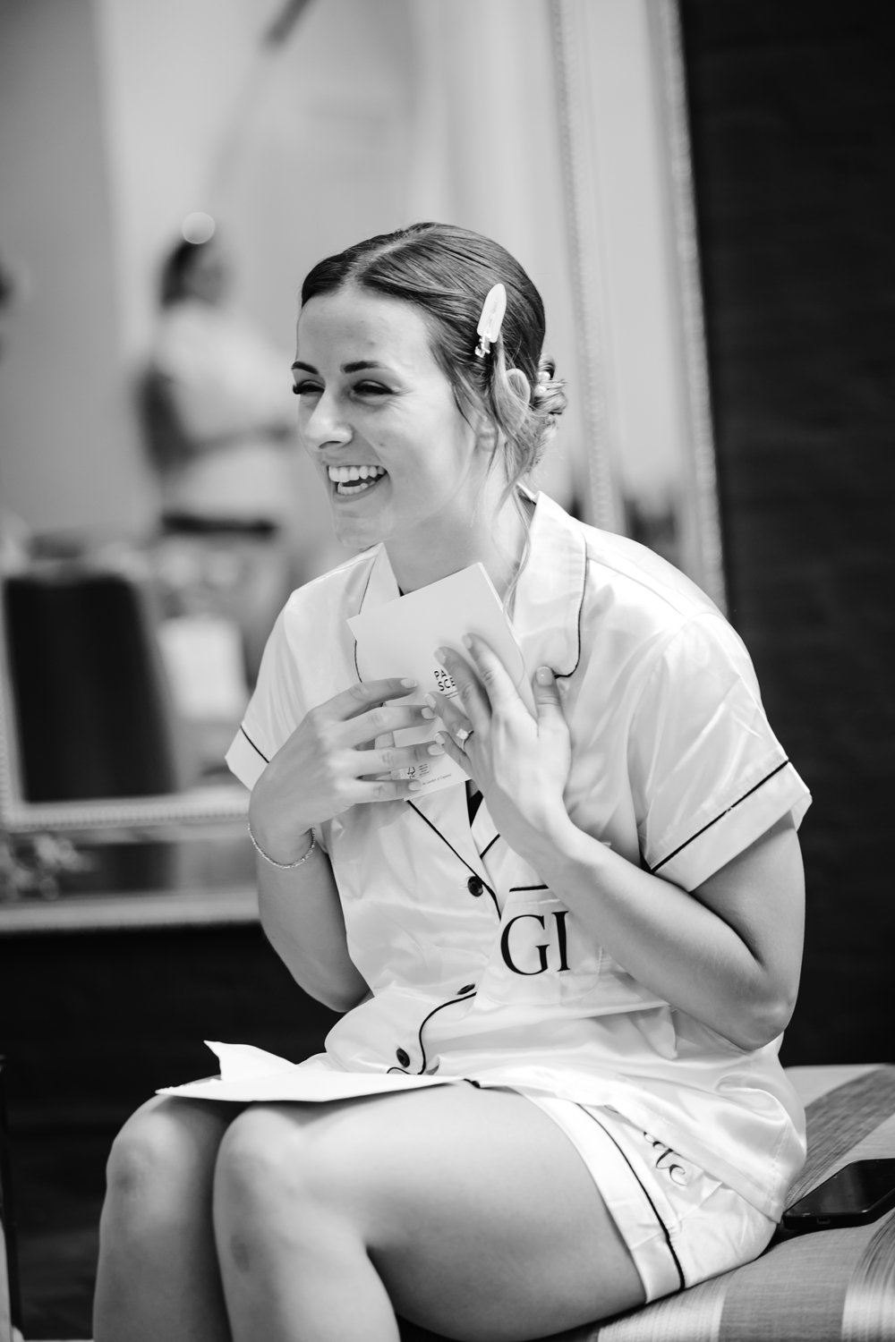A bride's joyful reaction at her wedding, captured in beautiful Durham wedding photography
